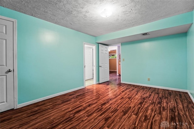 286 Honey Jane Dr, Beavercreek, OH 45434 - spare room with baseboards, wood finished floors, and a textured ceiling