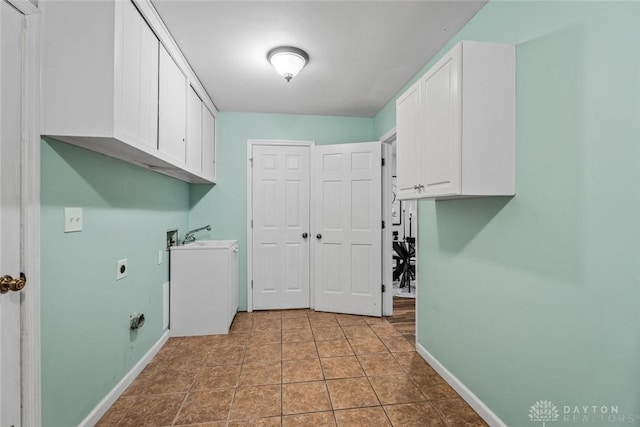 286 Honey Jane Dr, Beavercreek, OH 45434 - laundry room with cabinet space, hookup for an electric dryer, hookup for a washing machine, and baseboards