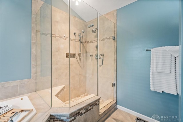 286 Honey Jane Dr, Beavercreek, OH 45434 - bathroom with a stall shower, a garden tub, and vaulted ceiling