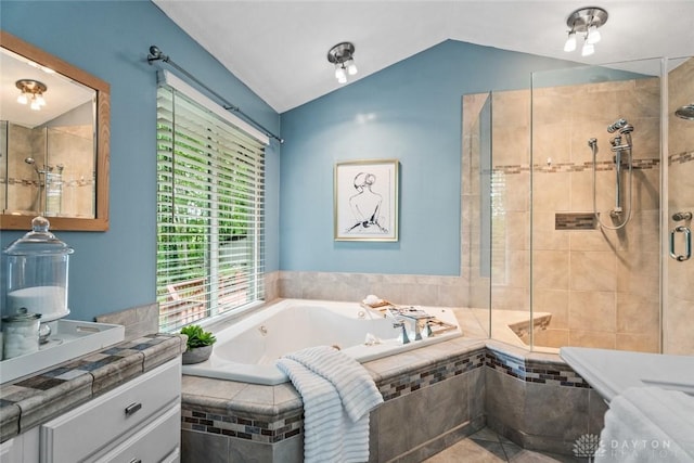 286 Honey Jane Dr, Beavercreek, OH 45434 - full bathroom with a tub with jets, vanity, lofted ceiling, and a shower stall