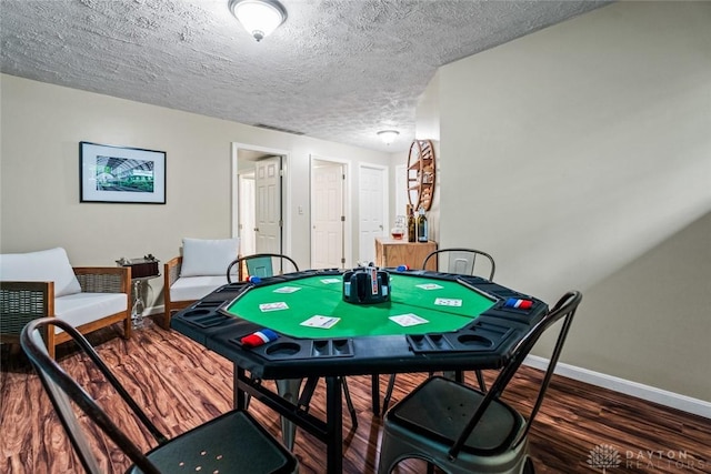 286 Honey Jane Dr, Beavercreek, OH 45434 - rec room with baseboards, a textured ceiling, and wood finished floors