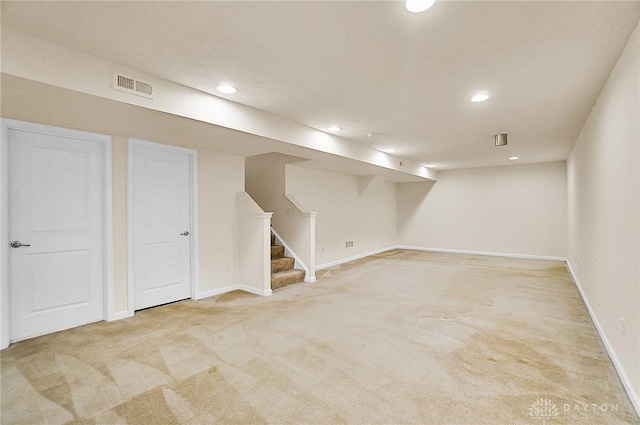 9752 Crooked Creek Dr, Centerville, OH 45458 - finished below grade area with stairs, light colored carpet, recessed lighting, and baseboards