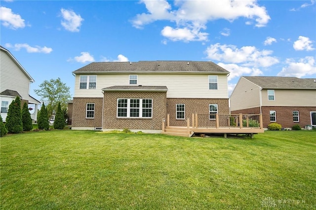 9752 Crooked Creek Dr, Centerville, OH 45458 - rear view of house featuring brick siding, a deck, and a yard