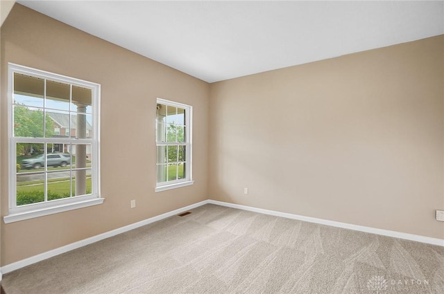 9752 Crooked Creek Dr, Centerville, OH 45458 - empty room featuring baseboards and light carpet