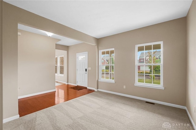 9752 Crooked Creek Dr, Centerville, OH 45458 - entryway featuring carpet flooring and baseboards
