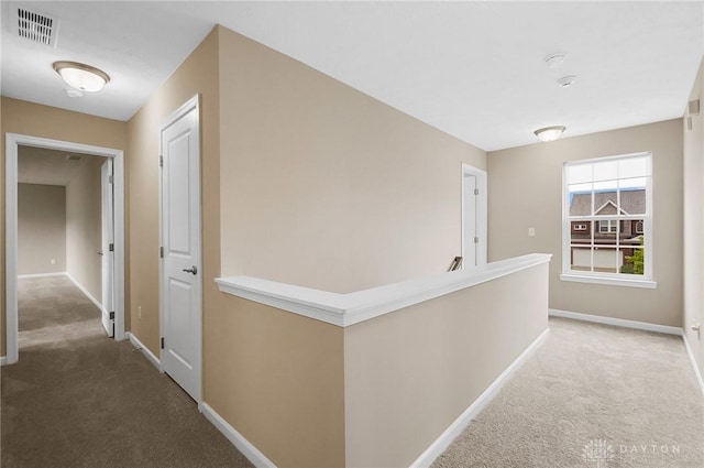 9752 Crooked Creek Dr, Centerville, OH 45458 - hall featuring carpet floors, baseboards, and an upstairs landing