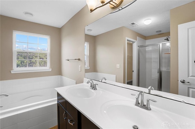 9752 Crooked Creek Dr, Centerville, OH 45458 - full bathroom featuring double vanity, healthy amount of natural light, a bath, and a shower stall