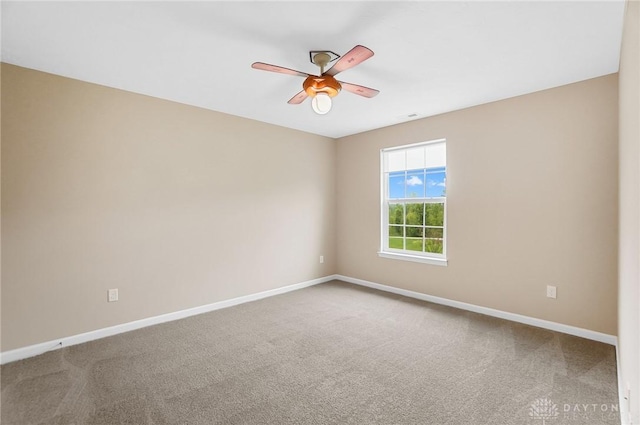 9752 Crooked Creek Dr, Centerville, OH 45458 - spare room featuring ceiling fan, baseboards, and carpet floors