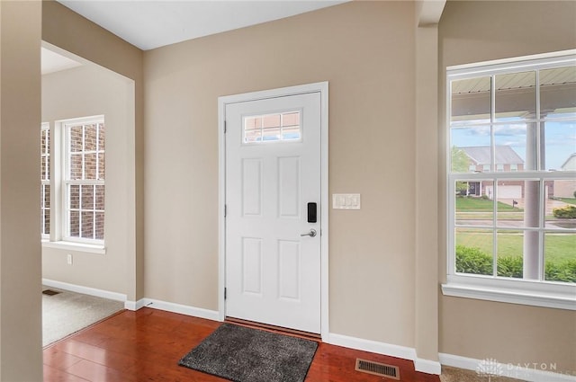 9752 Crooked Creek Dr, Centerville, OH 45458 - entrance foyer with healthy amount of natural light, baseboards, and wood finished floors