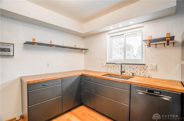 692 Sueden Dr, Beavercreek, OH 45430 - kitchen with open shelves, wooden counters, a sink, dishwasher, and recessed lighting