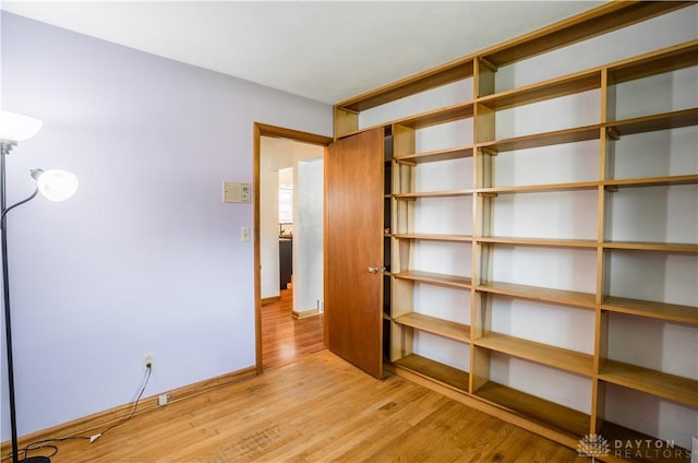 692 Sueden Dr, Beavercreek, OH 45430 - unfurnished bedroom with light wood-style flooring