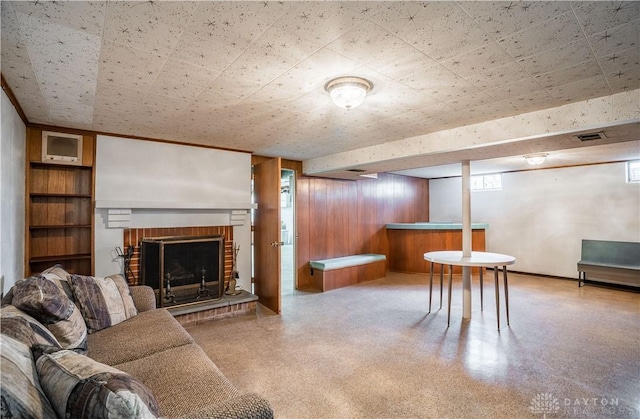692 Sueden Dr, Beavercreek, OH 45430 - living room featuring a fireplace, wooden walls, and a dry bar