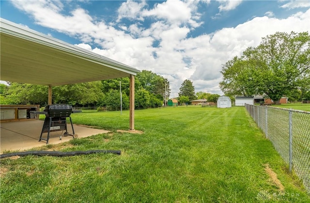 692 Sueden Dr, Beavercreek, OH 45430 - view of yard with a patio and a storage shed