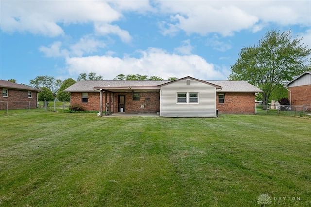 3558 Knollbrook Dr, Franklin Twp, OH 45005 - back of house with brick siding and a patio