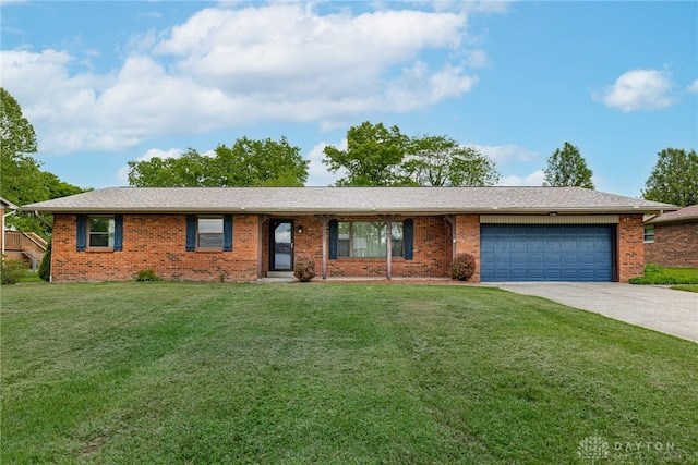 3558 Knollbrook Dr, Franklin Twp, OH 45005 - ranch-style home with an attached garage, driveway, brick siding, and a front yard
