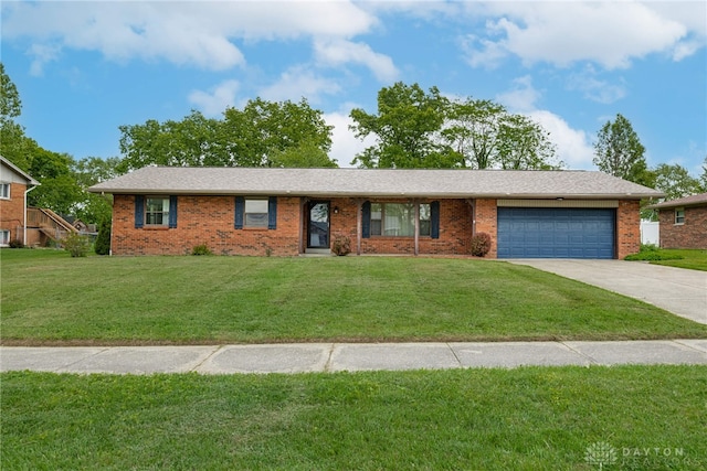 3558 Knollbrook Dr, Franklin Twp, OH 45005 - single story home with brick siding, an attached garage, driveway, and a front yard