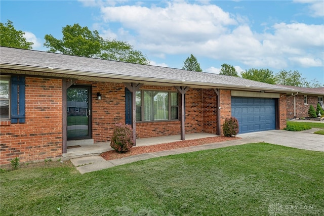 3558 Knollbrook Dr, Franklin Twp, OH 45005 - ranch-style house featuring a front lawn, an attached garage, brick siding, and concrete driveway