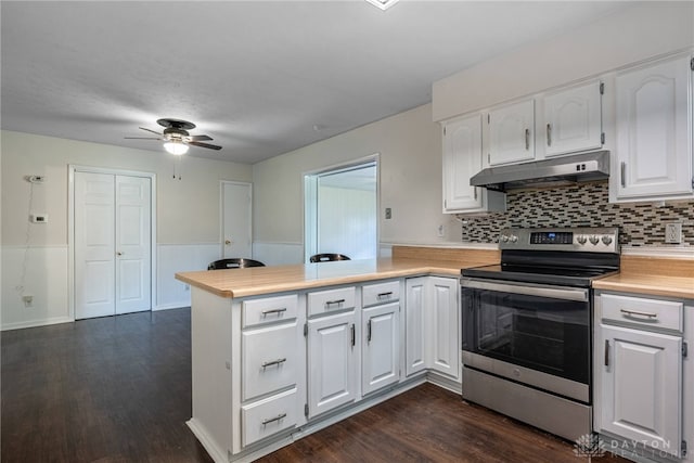 3558 Knollbrook Dr, Franklin Twp, OH 45005 - kitchen with stainless steel electric range oven, under cabinet range hood, a peninsula, light countertops, and white cabinets