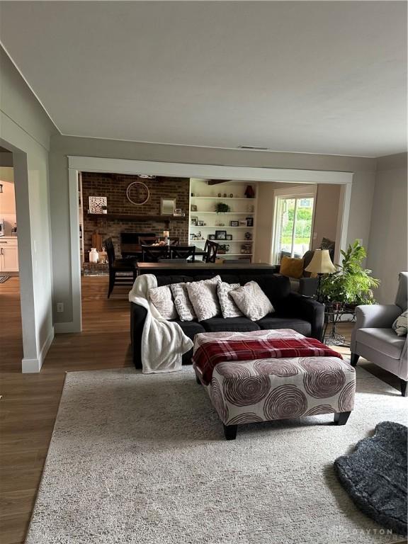 2419 Meadow Green Dr, Beavercreek, OH 45431 - living room with wood finished floors and baseboards