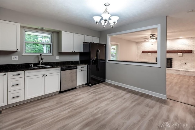 5920 Verdi Dr, West Carrollton, OH 45449 - kitchen featuring dishwasher, black fridge with ice dispenser, a sink, a chandelier, and light wood-style flooring