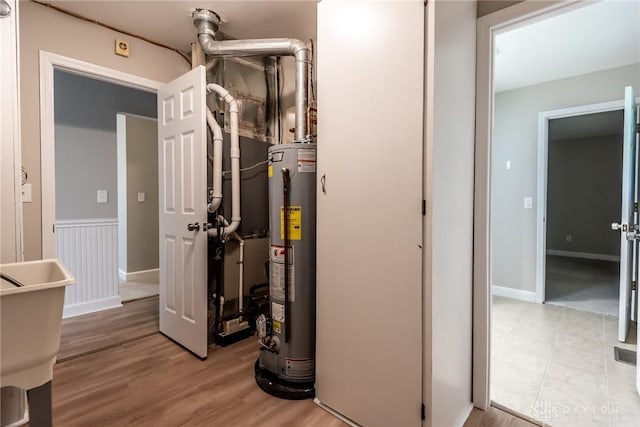 5920 Verdi Dr, West Carrollton, OH 45449 - utility room with gas water heater