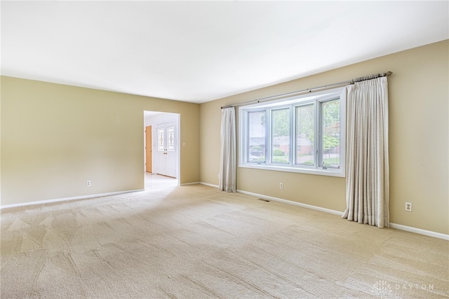 2301 Glenheath Dr, Kettering, OH 45440 - carpeted empty room with baseboards