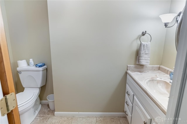 2301 Glenheath Dr, Kettering, OH 45440 - half bath featuring toilet, vanity, and baseboards