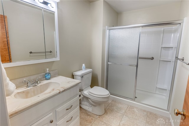2301 Glenheath Dr, Kettering, OH 45440 - bathroom with vanity, a stall shower, toilet, and tile patterned floors