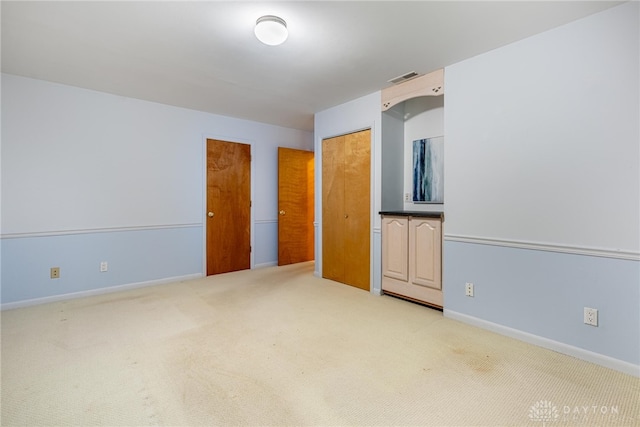 2301 Glenheath Dr, Kettering, OH 45440 - unfurnished bedroom with light carpet and baseboards