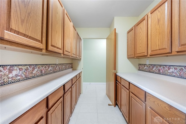 2301 Glenheath Dr, Kettering, OH 45440 - kitchen featuring light countertops and light tile patterned flooring