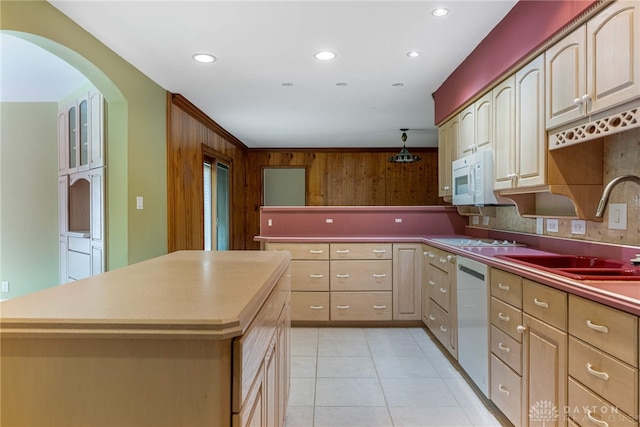 2301 Glenheath Dr, Kettering, OH 45440 - kitchen with a sink, white appliances, a kitchen island, light tile patterned floors, and recessed lighting
