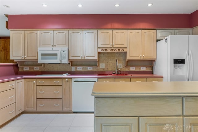 2301 Glenheath Dr, Kettering, OH 45440 - kitchen featuring white appliances, a sink, light brown cabinets, backsplash, and light tile patterned floors