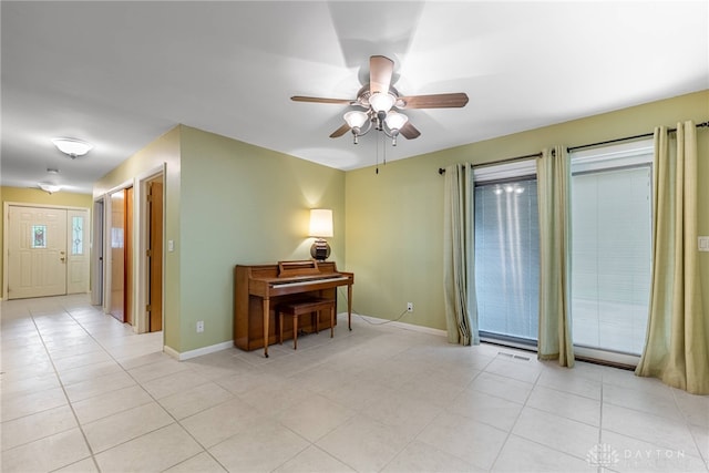 2301 Glenheath Dr, Kettering, OH 45440 - spare room with a ceiling fan, light tile patterned floors, and baseboards