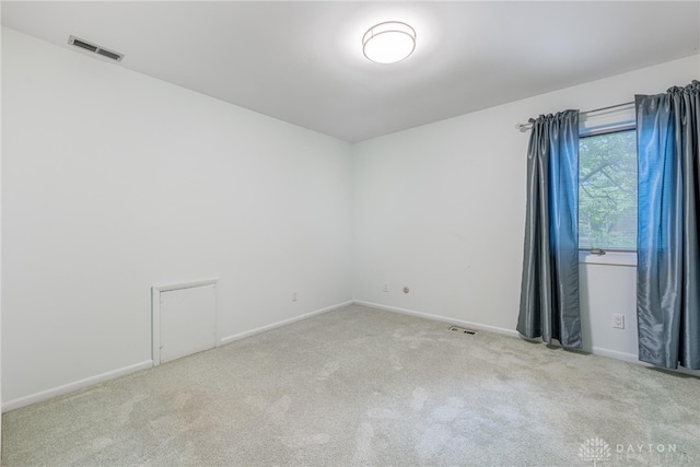 2301 Glenheath Dr, Kettering, OH 45440 - spare room featuring carpet floors and baseboards