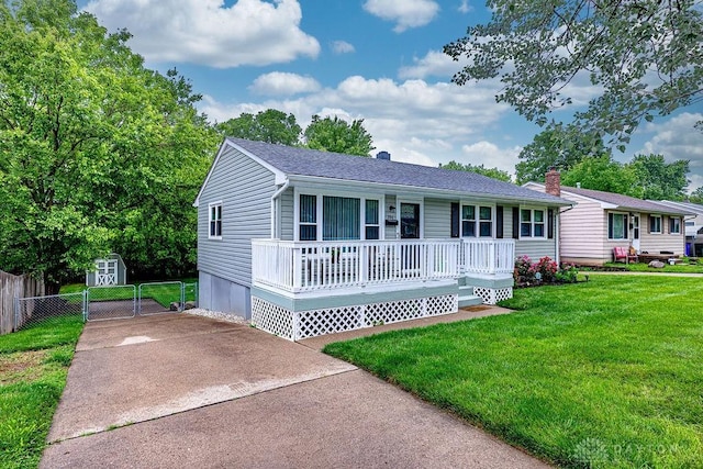 286 Chamberlin Dr, Hamilton, OH 45013 - single story home with covered porch, a shingled roof, and a chimney