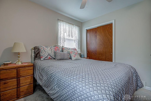 286 Chamberlin Dr, Hamilton, OH 45013 - bedroom with carpet, a closet, ceiling fan, and baseboards