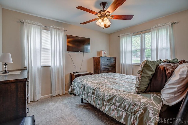 286 Chamberlin Dr, Hamilton, OH 45013 - bedroom with light carpet, baseboards, and a ceiling fan