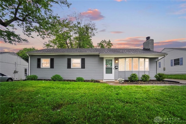 2541 Barryknoll St, Kettering, OH 45420 - ranch-style home with a yard and a chimney