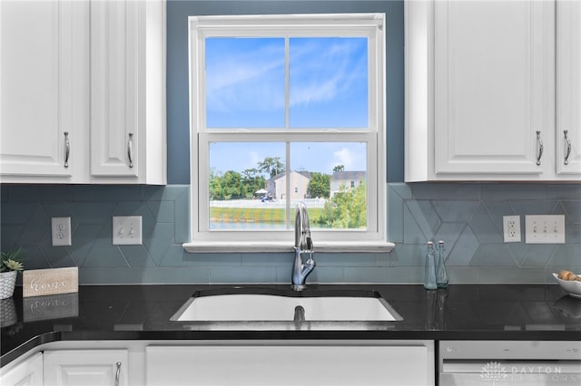 109 Waterford Blvd, Fairborn, OH 45324 - kitchen featuring dishwasher, white cabinetry, and dark countertops