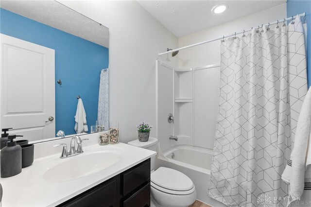 109 Waterford Blvd, Fairborn, OH 45324 - full bathroom with a textured ceiling, vanity, shower / bath combo with shower curtain, and recessed lighting