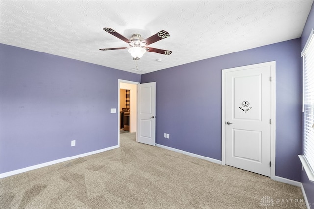 109 Waterford Blvd, Fairborn, OH 45324 - unfurnished bedroom with carpet floors, a textured ceiling, and ceiling fan