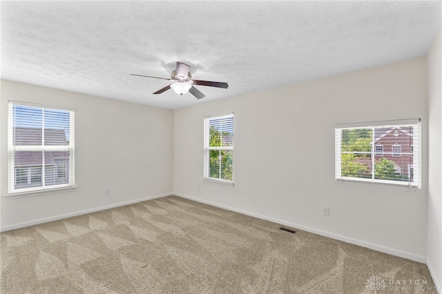 109 Waterford Blvd, Fairborn, OH 45324 - empty room featuring carpet, ceiling fan, and a textured ceiling