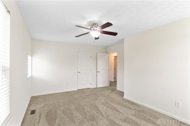 109 Waterford Blvd, Fairborn, OH 45324 - unfurnished bedroom featuring carpet and ceiling fan