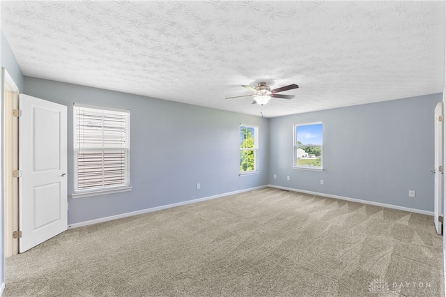 109 Waterford Blvd, Fairborn, OH 45324 - unfurnished room with a ceiling fan, carpet flooring, and a textured ceiling