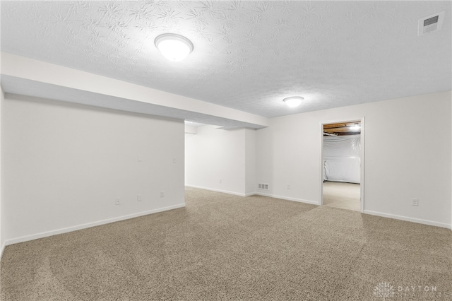 109 Waterford Blvd, Fairborn, OH 45324 - finished below grade area featuring a textured ceiling and carpet
