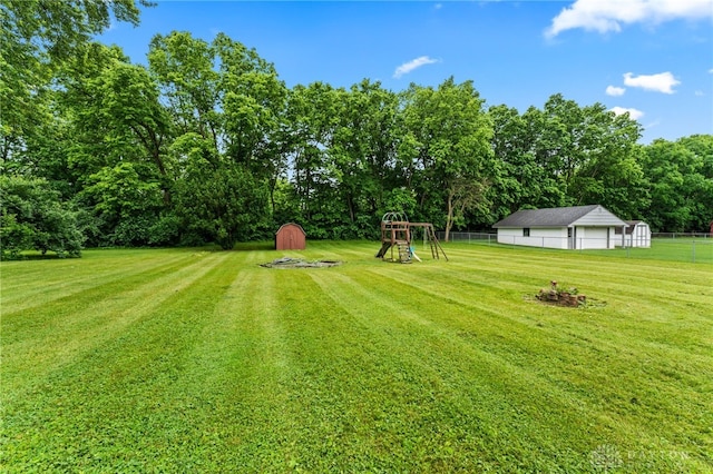 479 E Lomar Ave, Franklin, OH 45005 - view of yard featuring a playground and view of scattered trees
