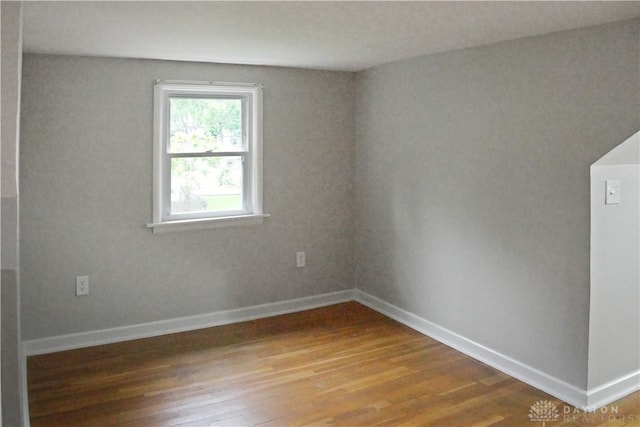 3145 Mohican Ave, Kettering, OH 45429 - unfurnished room with wood finished floors and baseboards