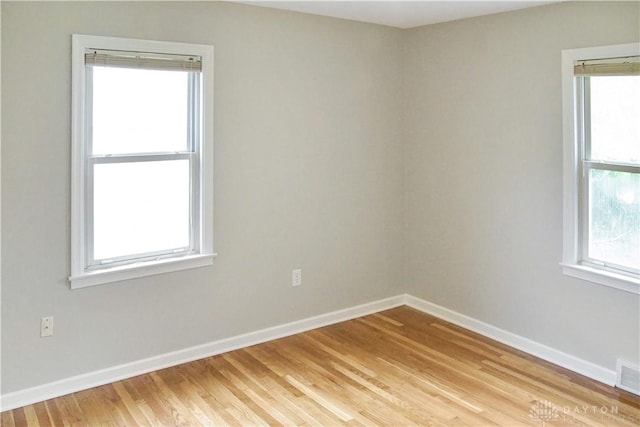 3145 Mohican Ave, Kettering, OH 45429 - spare room with light wood-style flooring and baseboards