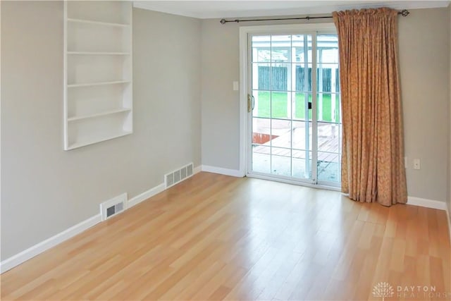 3145 Mohican Ave, Kettering, OH 45429 - unfurnished room featuring wood finished floors and baseboards