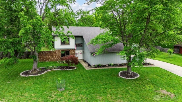 360 Merrick Dr, Beavercreek, OH 45434 - view of front of house with brick siding, roof with shingles, and concrete driveway